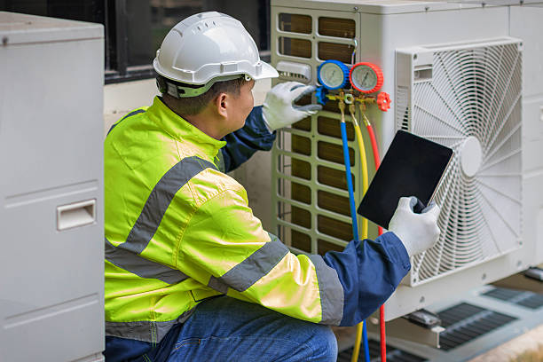 Professional Hvac technician working in Mission, KS